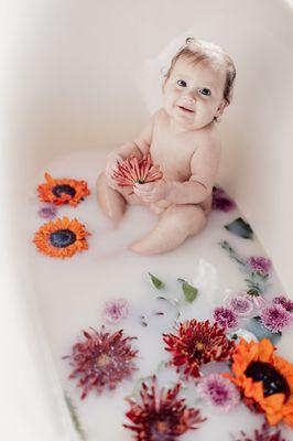 Baby girl milk bath photos in studio