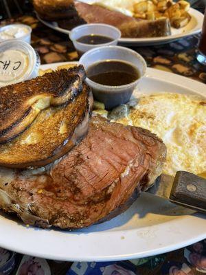 Prime rib with eggs.