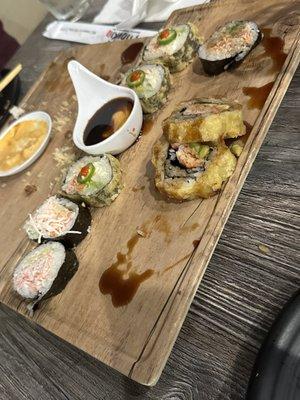 Part of deep-fried California roll, Sun Devil (the one with a jalapeño on top), Bonzai roll