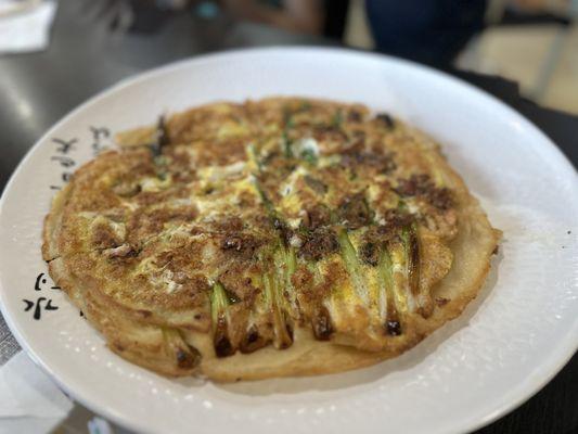 Seafood pancake. Not your typical Korean pancake batter but it is sooooo good. Highly recommend.