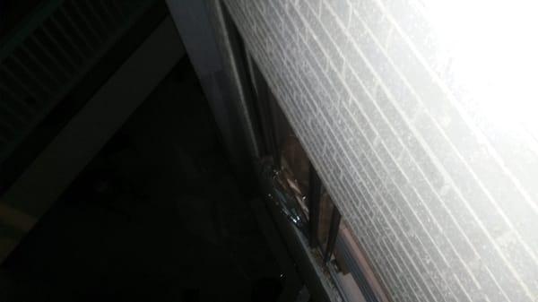 Picture of the window busted out.