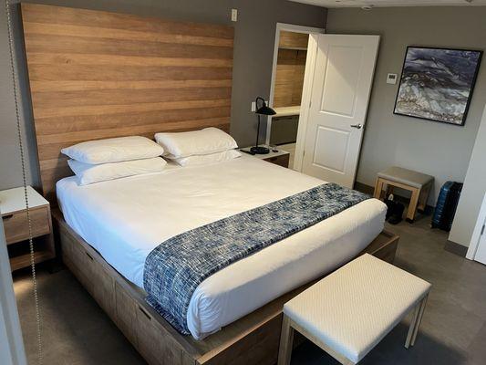 This is the bedspace. Cabinetry underneath the bed. Windows look out to haystack rock.