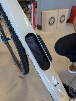 Storage hole on a regular bike. No this is not for a battery.