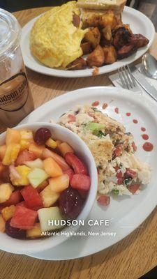 Fruit bowl, potatos and veggie omelette