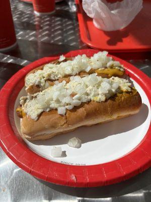 Chili cheese slaw dog with onions