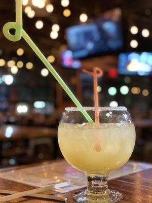 A Peach Margarita glass / fish bowl