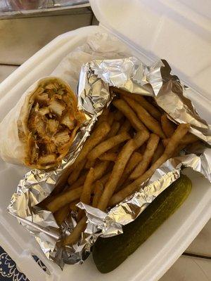 Buffalo chicken wrap with French fries.