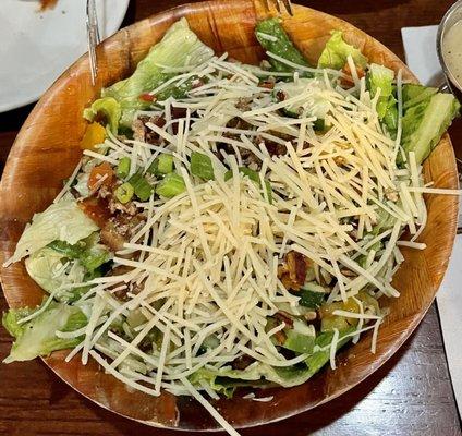 Chop Salad lettuce blend red & yellow tomatoes, cucumbers, bacon, candied pecans, parmesan cheese & green onions