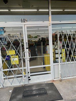 The gate is half open however the door is locked within the store hours