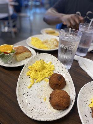 Salmon Croquettes with scrambled egg, biscuits and fruit