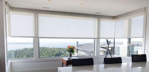 Take advantage of your glass window view using our Sheer fabric Roller Shades!