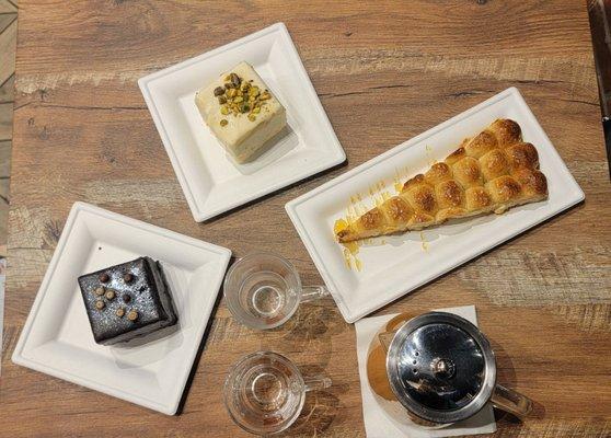 Left to right : Caramel Chocolate cake, Pistachio cake, Cream cheese filled pastry, Adeni Chai pot