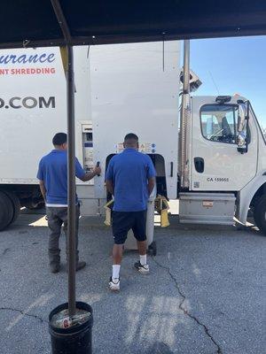 The truck with Max and Julio working hard.