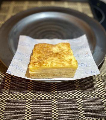 Spanish Tortilla (heavy on the spuds, like a slice of scalloped potatoes).