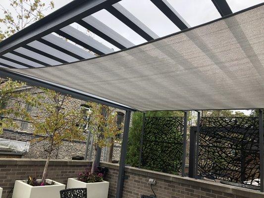 All steel pergola with shade sail