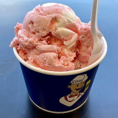 2 scoops of ice cream: cherry and strawberry