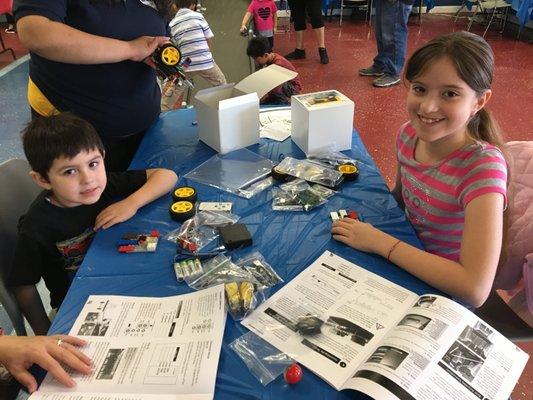 Building Robots! We offer Robotics, Coding for Kids, Video Game Design and a host of other STEM related classes and activities.