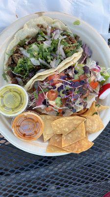 Carne asada taco and shrimp taco. Comes with chips and the salsa.