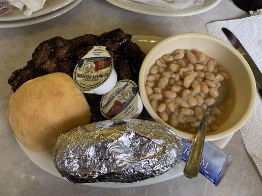 Ribeye Steak Dinner with baked potato & white beans