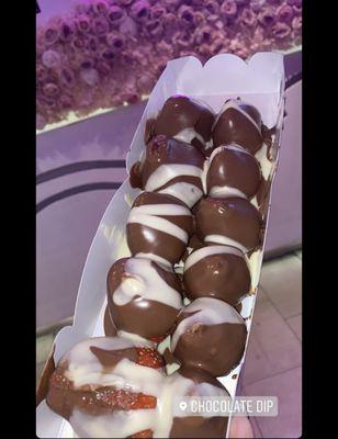 Chocolate covered Strawberry with white chocolate swirls. Delicious!!!