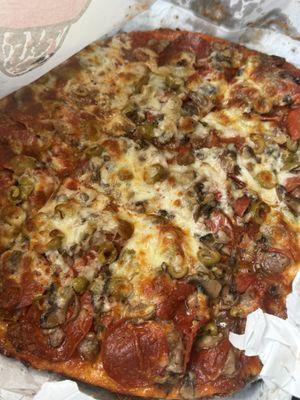 12" Medium - Thin Crust Pizza Pepperoni, sausage , mushroom, green olive slices.  Always order this for last 5 years