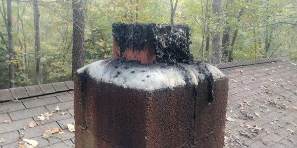 This is the creosote produced by a wood stove insert starving the fire for air makes smoke ..smoke and moisture make creosote.. creosote bad