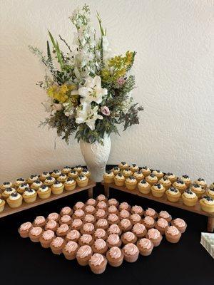 Pink champagne cupcakes with Bavarian cream filling and lemon cupcakes with lemon curd filling....