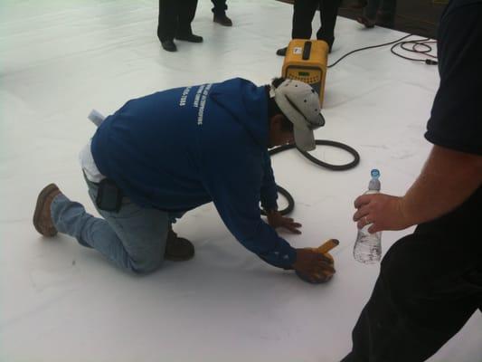 Technician roof installation training