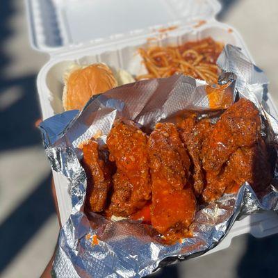 Hot lemon pepper wings and garlic spaghetti