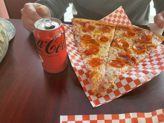 These slices are so much bigger in real life! $5.99 for two HUGE slices and a drink (possibly a lunch only special?)