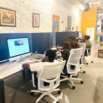 Coworking and lounge space at The AI Hub