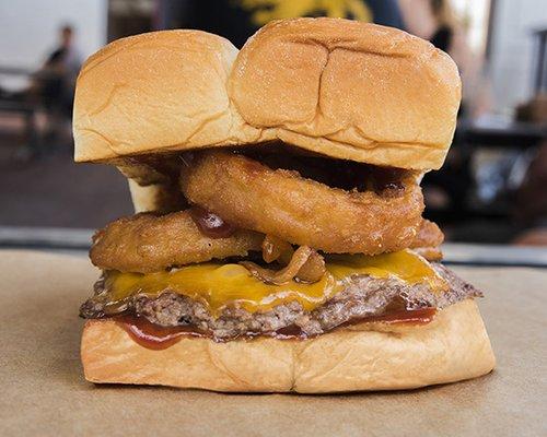 RINGER - cheddar cheese, smoked bacon, onion rings, bbq sauce