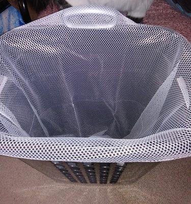 The basket my clothes were supposed to go in when they were done.