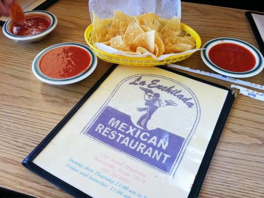 Chips, salsa, and a menu - La Enchilada Mexican Restaurant -n- Cantina: Woodville, Texas