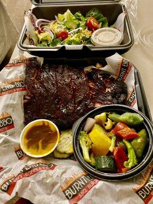 Juicy ribs, mixed veggies-bell peppers, onions, zucchini and broccoli, crisp salad with citrus vinaigrette .