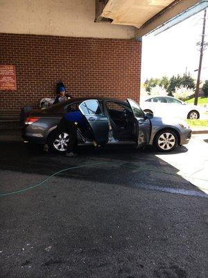 Post car wash, wiping down my car inside and out