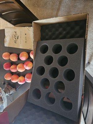 Peach tree truck case of peaches.