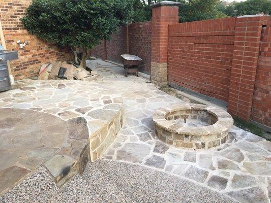 After extended flagstone patio and fire pit