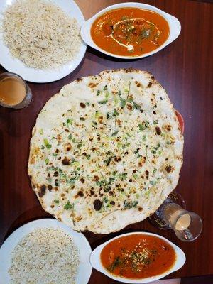 Butter Chicken, Tekka Masala, Garlic Naan, and Masala Chai.