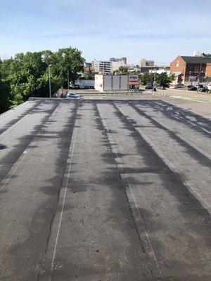 Nissian dealership torchdown modified roofing another great job by exterior solutions