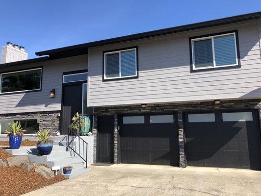 Finished two story house. With two toned black and grey finish.