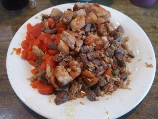 Steak, chicken, rice and carrots