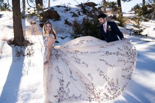 Alice delicately moved all the flowers from around the trim, up, when she was hemming the dress.