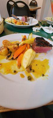 Filet mignon with peppercorn sauce and Scallops in saffron sauce