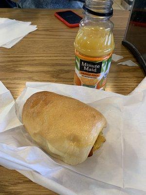 Warm Kolache Wrap with bacon, egg and cheese and some orange juice.