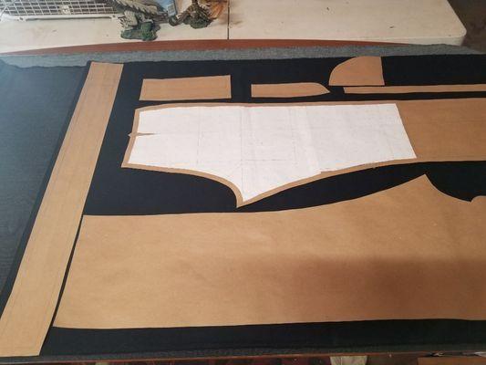 Bespoke slack pattern being laid out for cutting.