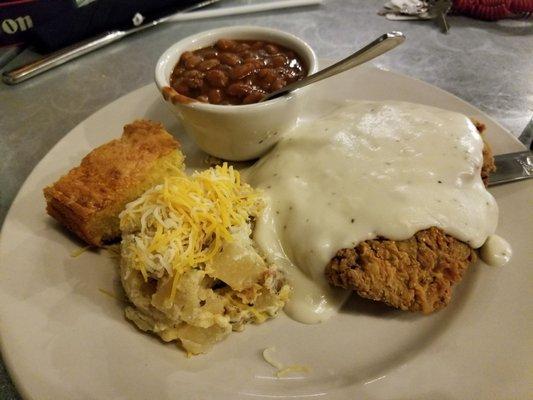 Chicken fried steak with baked potato casserole, jalapeno corn bread and pinto beans