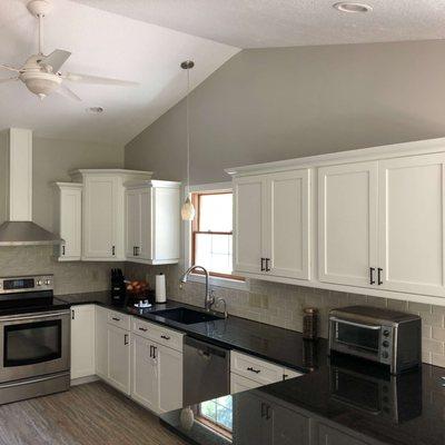 Cabinetry painted white, interior home painted grey.