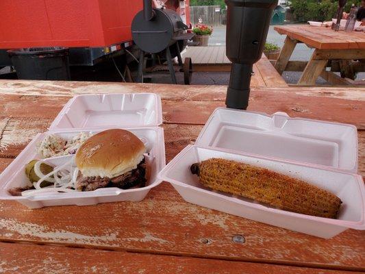 Smoke Brisket sandwich and Mexican Corn.