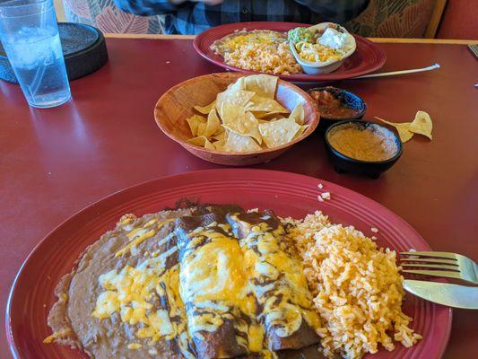 Mole enchiladas and the sides to the fajitas (chicken hadn't come yet in this photo)